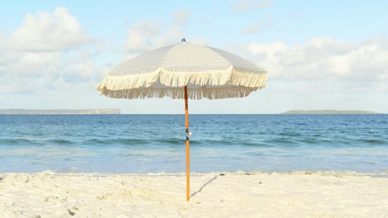 How to Put a Beach Umbrella in Sand?